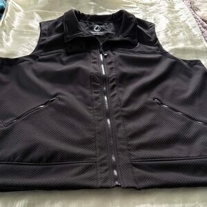 VEST, ZIP FRONT, ZIP POCKETS, BLACK, SZ 4X, POLYESTER, STAND UP BUTTON COLLAR,